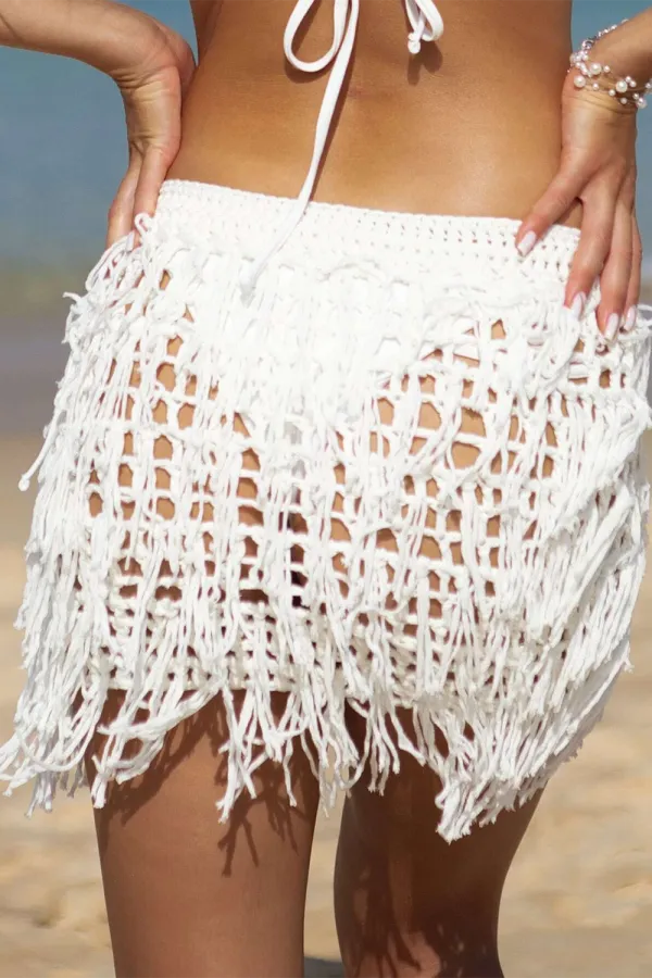 Crocheted beach cover-up skirt with cutout fringe hem